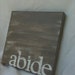 hand painted abide sign