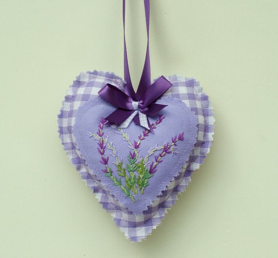 Lavender heart shaped bag with hand by BrushesAndBodkins on Etsy