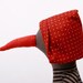 cloth bird With red hat Dotted , Wearing brown stripes Shirt &corduroy trousers -handmade doll