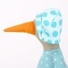 Neon duck with orange beak wearing turquoise shirt with dots,neon green corduroy pants and a blue hat with spots - handmade doll