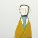 Man - a guy with glasses And beard wearing Yellow mustard jacket gray striped pants and dotted turquoise tie - handmade