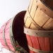 Three Vintage Country Baskets Two Red and One Natural