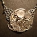 Steampunk Watch Movement Necklace with Filigree Wings