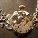 Steampunk Neo Victorian Watch Movement Necklace on Floral Calligraphy Setting