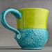 Curvy Dottie Mug: Caribbean Blue Neon Green Curvy Dottie Mug by Symmetrical Pottery