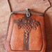 Antique 1915-1918 Jemco Arts and Crafts hand tooled leather purse with grapevine motif