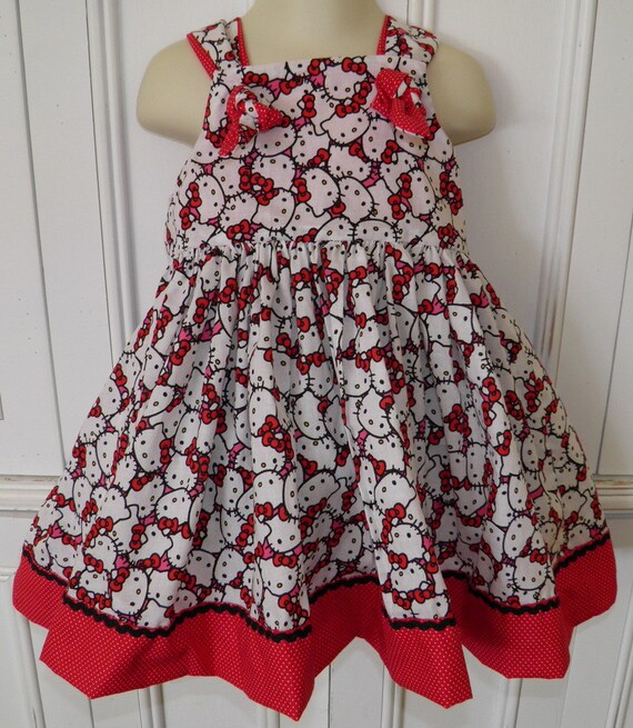 Items similar to Hello Kitty Packed Faces Boutique Dress Red Pink Size