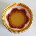 Folded paper bowl with flower pattern