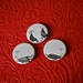 Edward Gorey Pinback Buttons - Set of Three 1.25 inch Featuring a Bicycle Accident