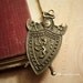 3pc of Antiqued Bronze Knight Shield Crest Coat of Arms, Lion and Axe Charm Pendant Drop Rd C11