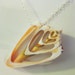 Conus Shell Cross-section and Sterling Silver Pendant Necklace