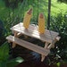 Picnic table squirrel feeder