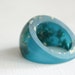 aqua dome ring with suspended gold flakes eco resin