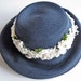 Vintage Marshall Field midnight blue ladies straw hat with white flowers, blue ribbon, summer wedding hat, 1950s spring garden party hat