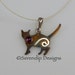 Rustic Sterling Silver Cat Necklace with Garnet and Spiral