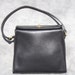 Coach Geometric black leather purse