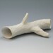 Hand carved white porcelain twig, faux bois