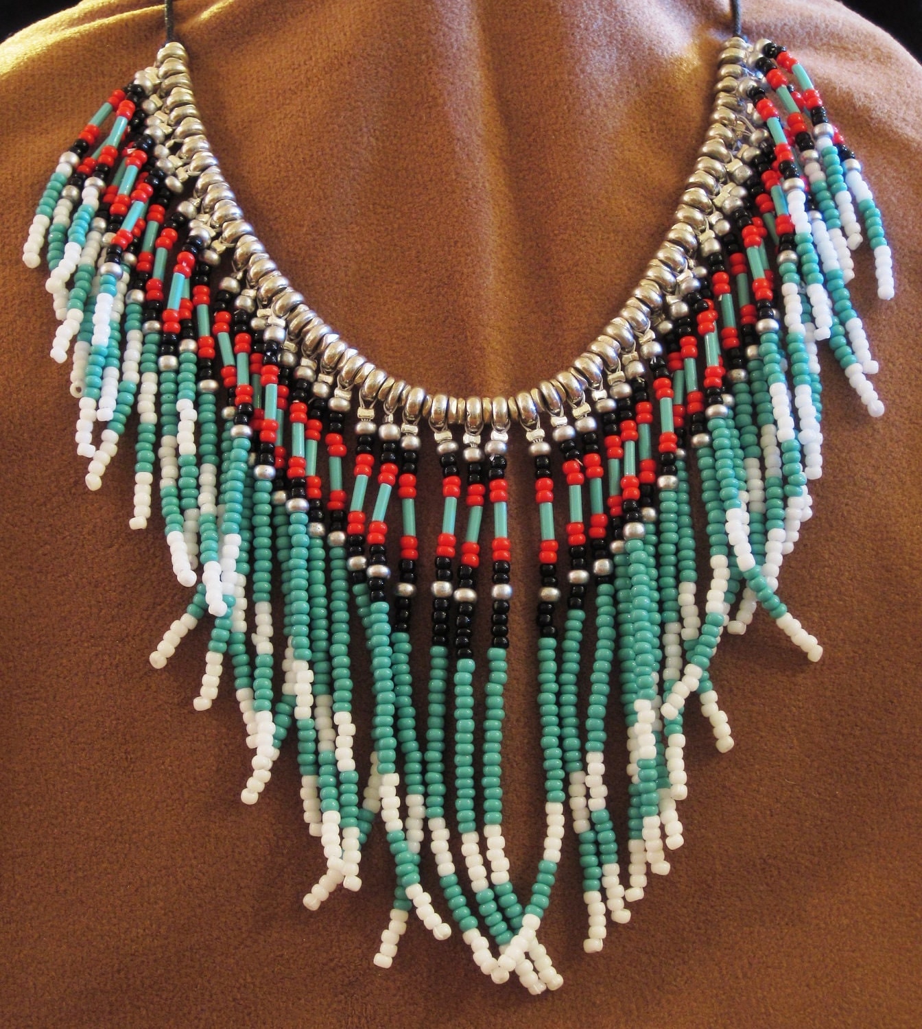 Native American style beaded necklace in turquoise red black