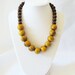 Large Mustard Porcelain Bead Necklace with Small Wooden Beads