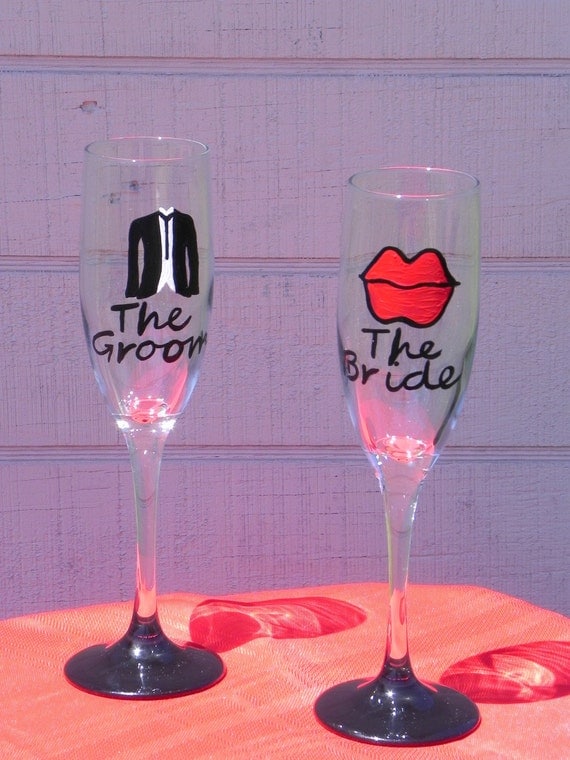 Custom Painted Lips and Tuxedo Champagne Wedding Flutes for the bride and groom