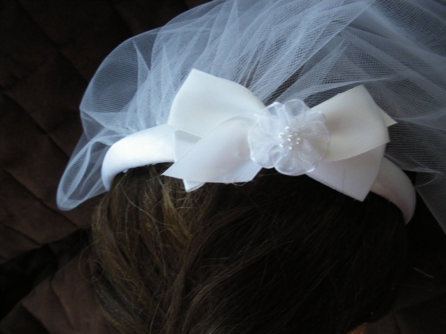 First Communion Headband Veil attached is a White Satin Bow