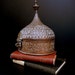 Exotic, Maroccan Influenced round container box in mysterious material / 9 1/2" high