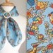 Anne Klein Bird Covered Scarf with Rhinestone Scarf Buckle