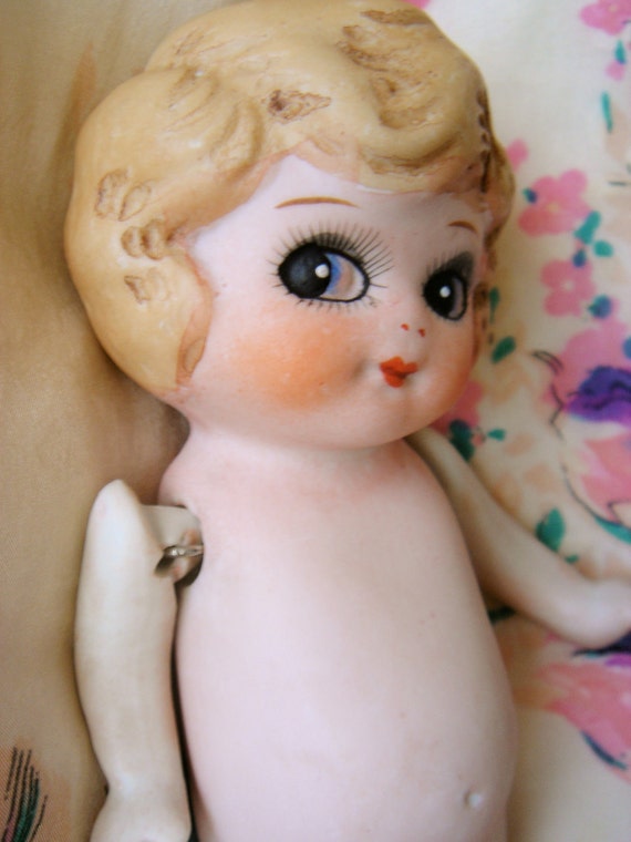 porcelain kewpie doll