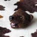 Needle felted pin - harmless brown bear