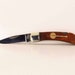 Rough Rider pocket knife with custom handle and cherry wood Banjo inlay