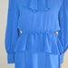 Vintage 1970s / secratary pussy bow mini dress Ruffled Bottom / Deadstock