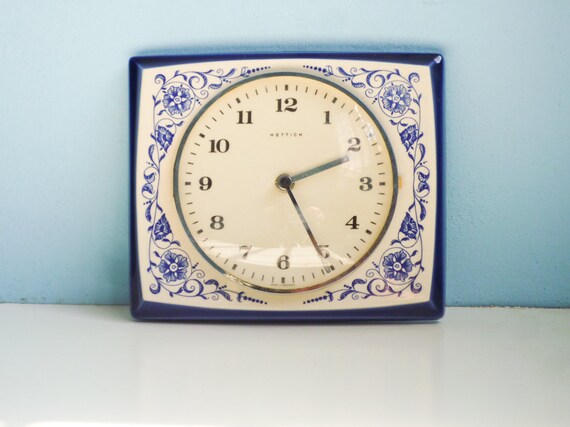 blue ceramic kitchen wall clock