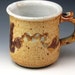 Mug With Brush Work On The Side With A Touch Of Turquoise