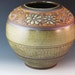 Large Hand Carved Vase With Flowers, Texturing, And Swirl Design