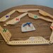 Pegs & Jokers 8 player Board Game 16" Red Oak