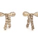 1930's Bow Shaped Rhinestone Earrings Patent 1967965