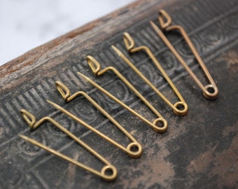 Set of 10 antique brass brooch back pins, clasps from 1920-1930s