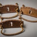Set of 3 antique key hole escutcheon with drawer pull handles.