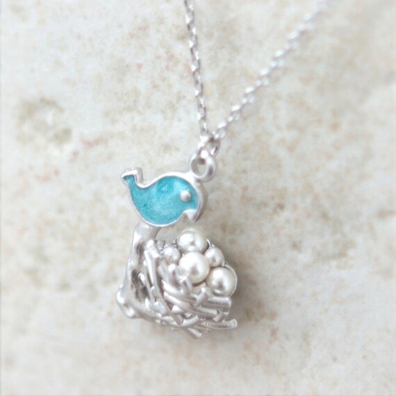 Items similar to Silver Bird Nest Necklace with white pearls on Etsy