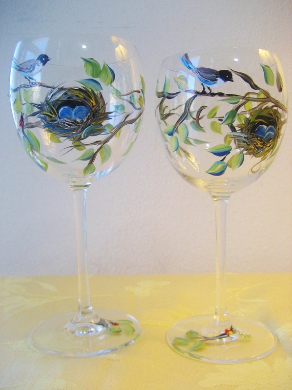 Handpainted wine glass with bluebird and nest. Set of two.