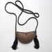 Unusual vintage 1970s boho hippie incised pillow brass clutch bag with silk tassel handle
