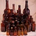 c1890-1940 Group of 35 Cork Top & screw top Amber Glass Medicine and Beverage Bottles