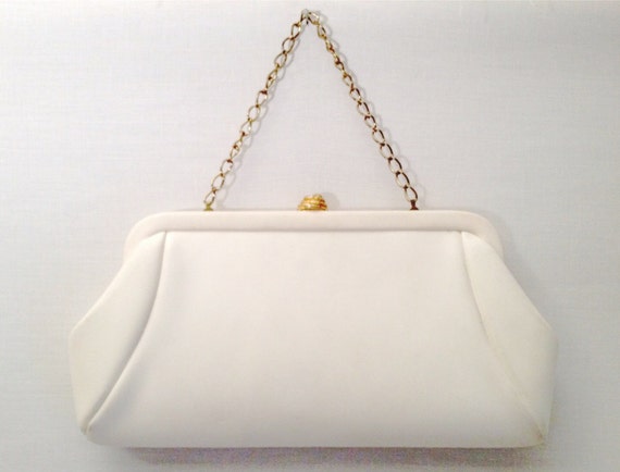 white clutch with gold