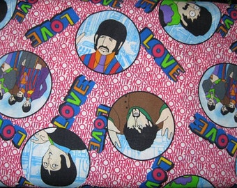 Beatles Yellow Submarine/All You Need Is Love Tossed Faces on Red cotton Fabric by VIP OOP