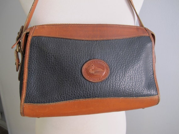 dooney and bourke navy and tan purse