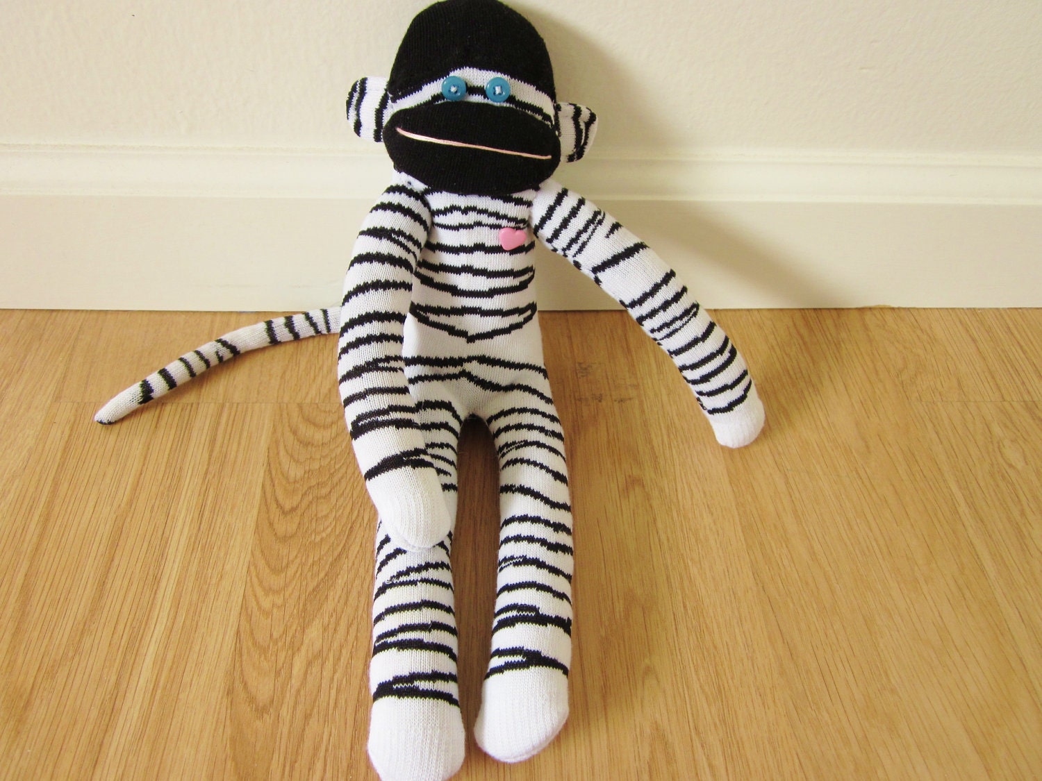 red and white striped sock monkey