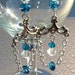 Teal crystal and silver chain earrings