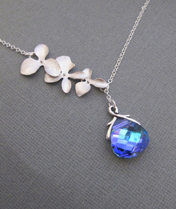 Items similar to LUCKY SALE Aqua Vitrail Light and Orchid lariat ...