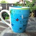 Lewis Carroll "You're entirely bonkers" Alice in Wonderland literary quote mug - Blue with Stars