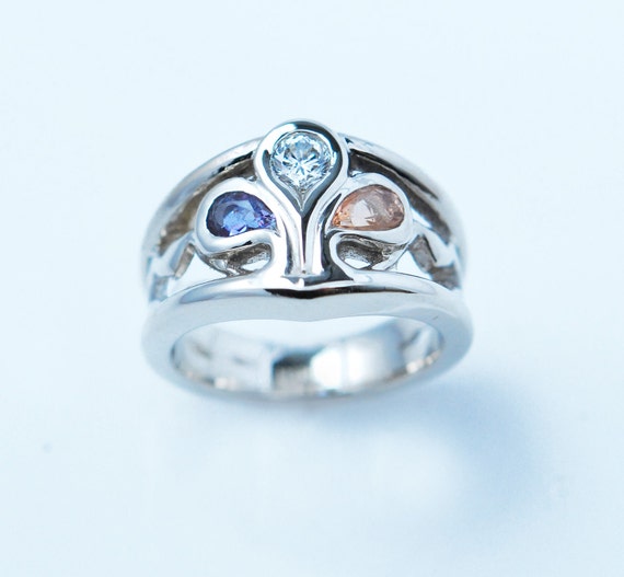 white gold mothers ring 4 stones